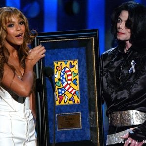 Beyoncé presents the Humanitarian Award to Michael Jackson at the 2003 Radio Music Awards held at the Aladdin Hotel and Casino in Las Vegas, Nevada, on October 27, 2003.
