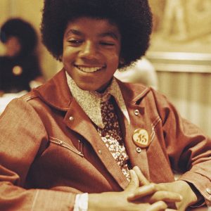 Michael Jackson wears a denim jacket in the 1970s.