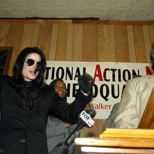 Michael Jackson with Reverend Al Sharpton at Sharpton's National Action Network headquarters in Harlem, New York, NY, in 2002.