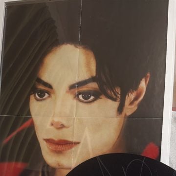 Michael’s signed fedora and poster