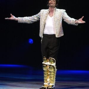 Michael Jackson performs at the Democratic National Committee's "A Night at the Apollo" voter registration drive and fundraiser at the Apollo Theater in New York, NY, in April 2002.