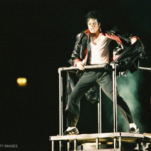 Michael Jackson performs on a stage platform during his Dangerous World Tour in 1992.