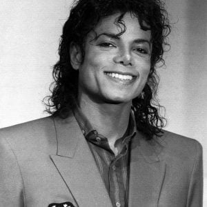 Michael Jackson at a press conference in New York, NY, on March 1, 1988 to present 0,000 check to United Negro College Fund