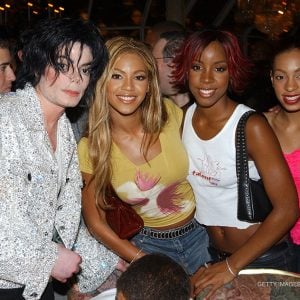Michael Jackson with Destiny's Child and Solange at the after party for the Michael Jackson: 30th Anniversary Celebration on September 7, 2001.